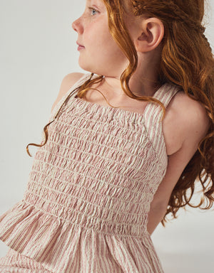 Flatlay front view of the Josephine Striped Peplum Top with Flower Appliqué, showcasing striped texture, appliqué placement, and peplum shape from the Spring Summer collection of Filipino kids fashion brand Gingersnaps Philippines.