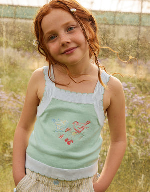 Campaign photo of the Gabriella Top with Cross-Stitch Embroidery & Scalloped Edges for kids from the Spring Summer collection of Filipino kids fashion brand Gingersnaps Philippines, featuring bird cross-stitch embroidery and scalloped ribbed trims.