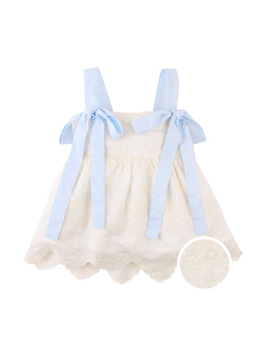 Campaign photo of the Leilani Embroidered Top with Bow Tie Straps for kids from the Spring Summer collection of Filipino kids fashion brand Gingersnaps Philippines, featuring delicate floral embroidery and bow tie shoulder straps.