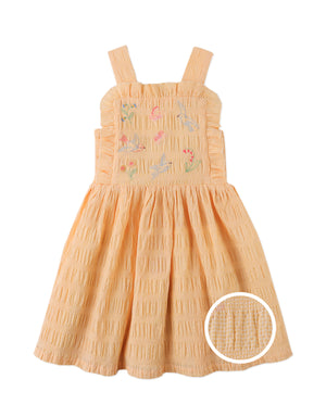 Flatlay front view of the Emily Ruffled Apron Dress with Botanical Embroidery, showcasing the gingham base, embroidered motifs, and ruffled accents from the Spring Summer collection of Filipino kids fashion brand Gingersnaps Philippines.