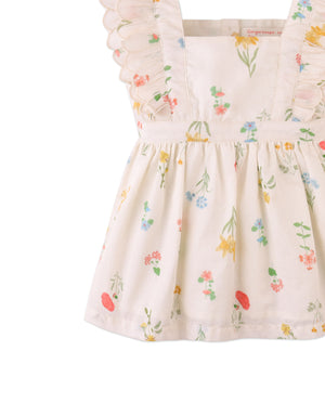 Flatlay front view of the Baby Chisa Dress with Embroidered Petal Ruffle Sleeves with floral embroidery and ruffle sleeve design from the Spring Summer collection of Filipino kids fashion brand Gingersnaps Philippines.