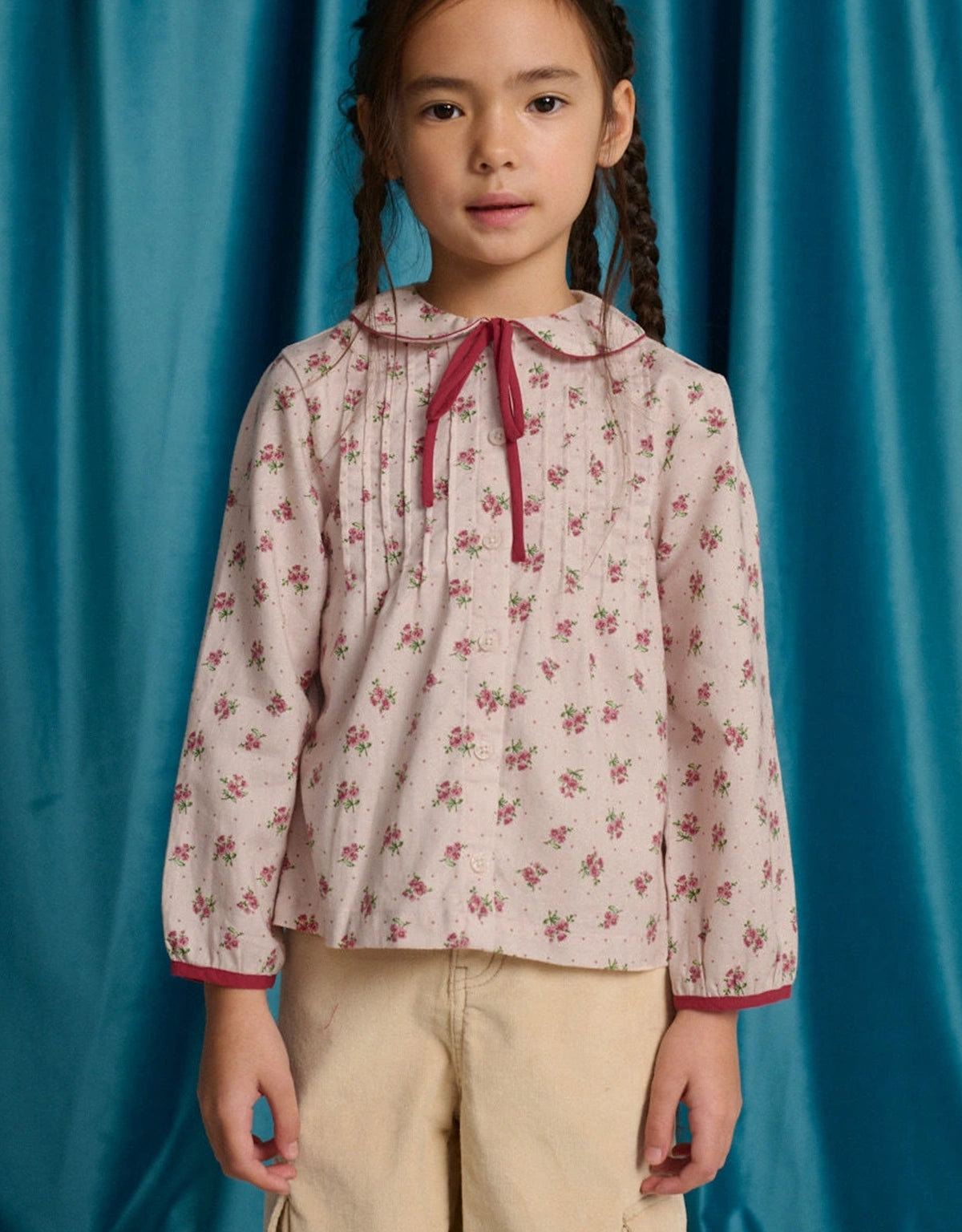 Caridad Blouse in Floral Print with Peter Pan Collar, Pintucks, and Contrasting Red Ties