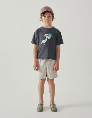 Full front catalog image of the Eld Pelican Relaxed-Fit Jersey Graphic Tee for kids, a short-sleeved jersey knit graphic tee with pelican print from the Summer collection of Gingersnaps Philippines.