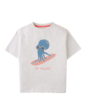 Flatlay front view of the Oruo Surfing Octopus Relaxed-Fit Graphic Tee with surfing octopus graphic print and jersey knit details from the Summer collection of Filipino kids fashion brand Gingersnaps Philippines.