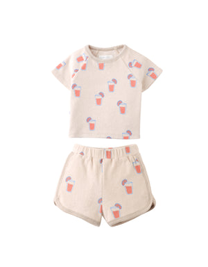 Flatlay front view of the Baby Matthew All-Over Print Raglan Tee and Shorts Set with print and raglan sleeve details from the Spring Summer collection of Filipino kids fashion brand Gingersnaps Philippines.