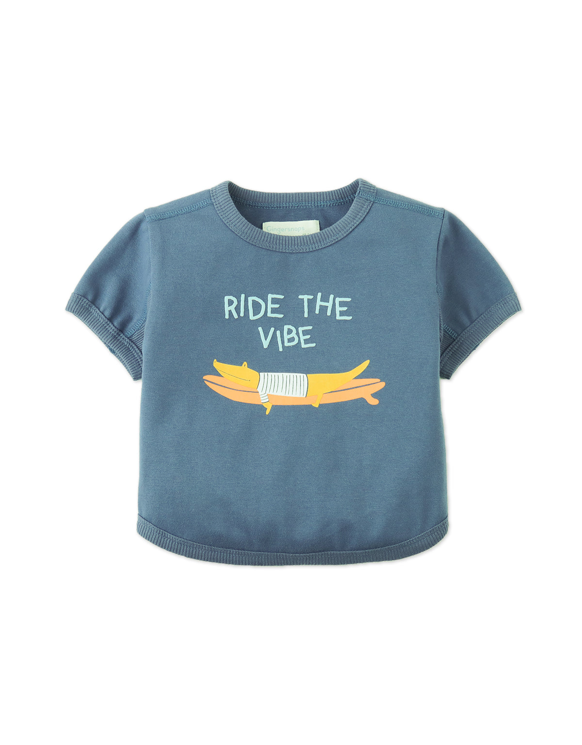 Flatlay front view of the Baby Chalice Cotton Barrel Tee in blue with surfing crocodile or gorilla print details from the Spring Summer collection of Filipino kids fashion brand Gingersnaps Philippines.