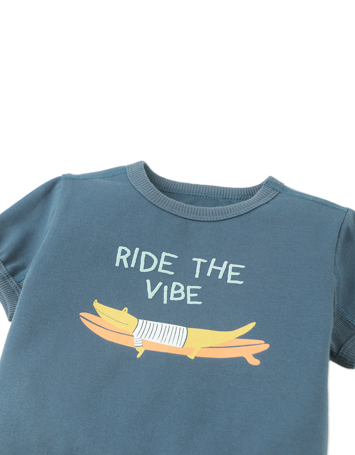 Close-up front detail of the Baby Chalice Cotton Barrel Tee in blue, highlighting the surfing crocodile graphics and breathable cotton fabric from the Spring Summer collection of Gingersnaps Philippines.
