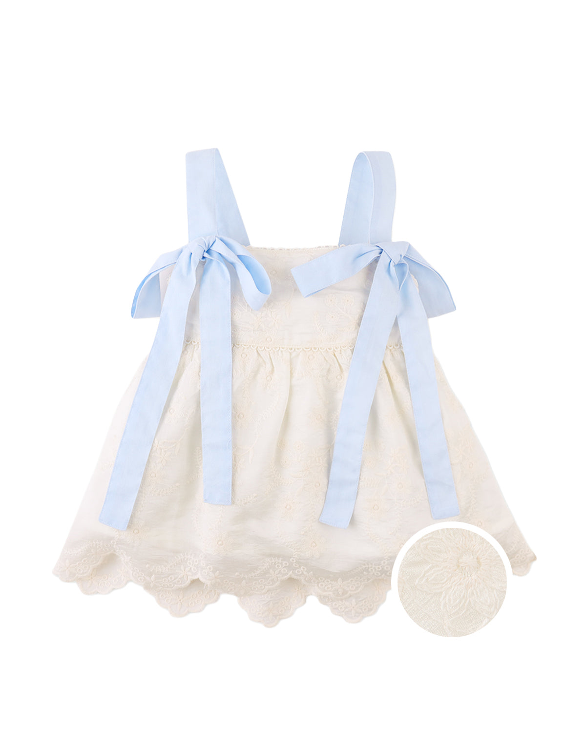 Campaign photo of the Leilani Embroidered Top with Bow Tie Straps for kids from the Spring Summer collection of Filipino kids fashion brand Gingersnaps Philippines, featuring delicate floral embroidery and bow tie shoulder straps.