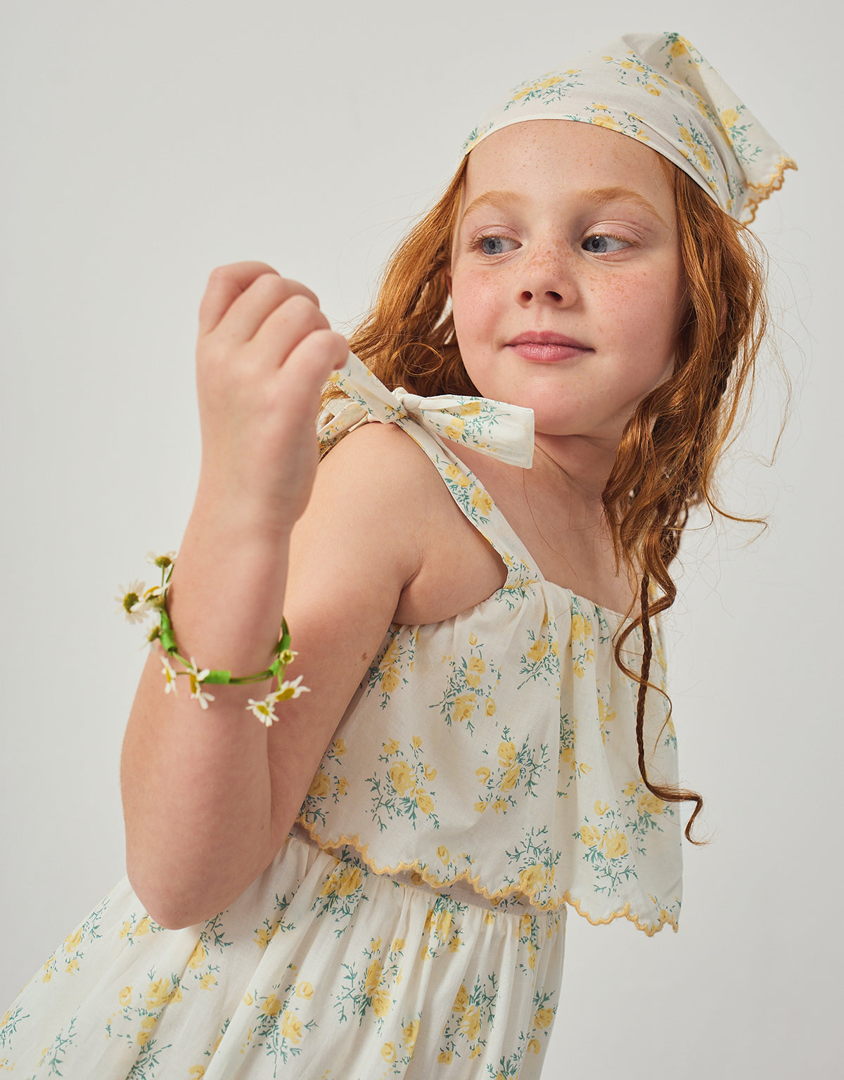 Flatlay front view of the Katie Sundress with Bow Tie Straps & Embroidery, showcasing embroidered bodice details and layered skirt construction from the Spring Summer collection of Filipino kids fashion brand Gingersnaps Philippines.