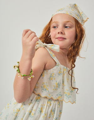 Flatlay front view of the Katie Sundress with Bow Tie Straps & Embroidery, showcasing embroidered bodice details and layered skirt construction from the Spring Summer collection of Filipino kids fashion brand Gingersnaps Philippines.