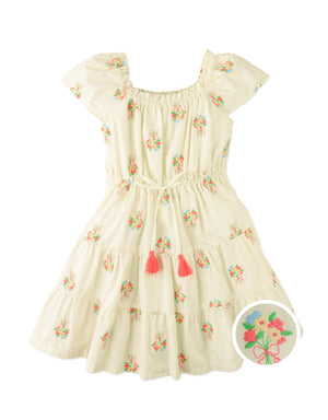 Campaign photo of the Avery Embroidered Dress with Bubble Sleeves for kids from the Spring Summer collection of Filipino kids fashion brand Gingersnaps Philippines, featuring floral embroidery, bubble sleeves, and an empire waist.