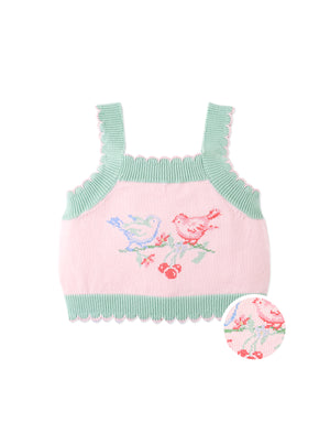 Campaign photo of the Baby Rosé Combed Cotton Knit Top with Cross-Stitch Embroidery for kids from the Spring Summer collection of Filipino kids fashion brand Gingersnaps Philippines, featuring pink combed cotton knit and playful bird cross-stitch embroidery.
