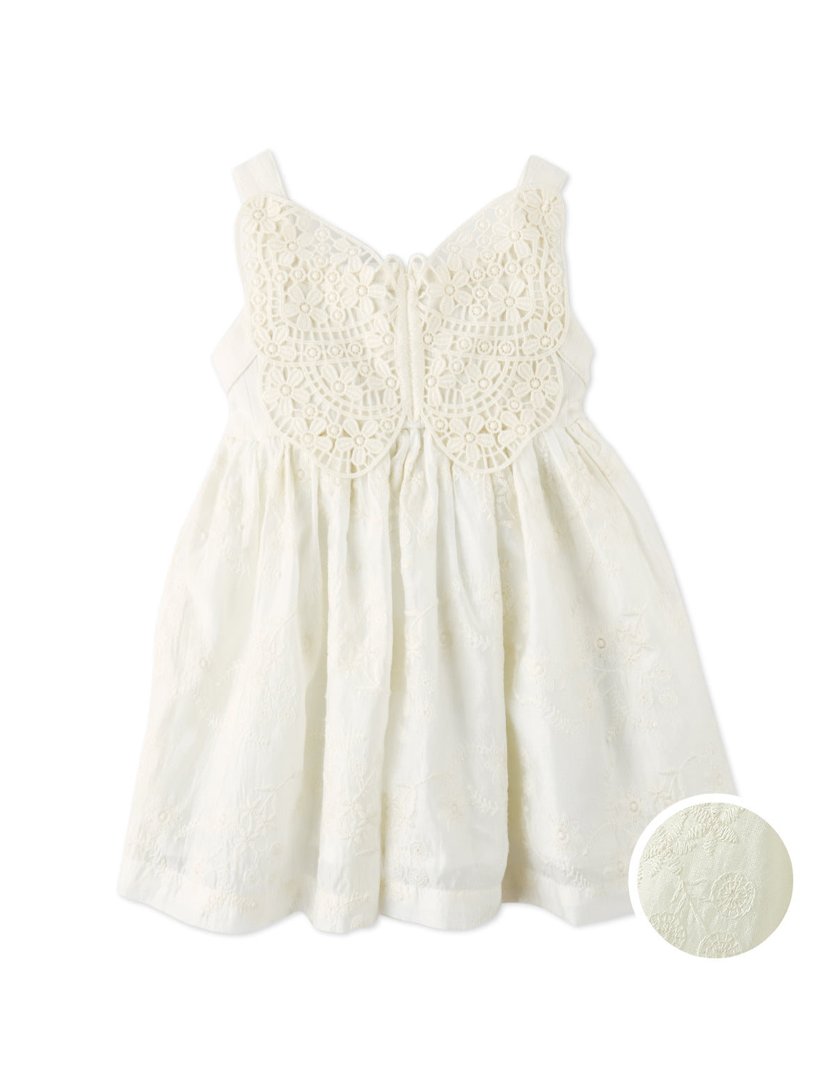 Campaign photo of the Baby Gabrielle Eyelet Dress with Crochet Butterfly Appliqué for infant girls from the Spring Summer collection of Filipino kids fashion brand Gingersnaps Philippines, featuring eyelet fabric and a crochet butterfly detail.