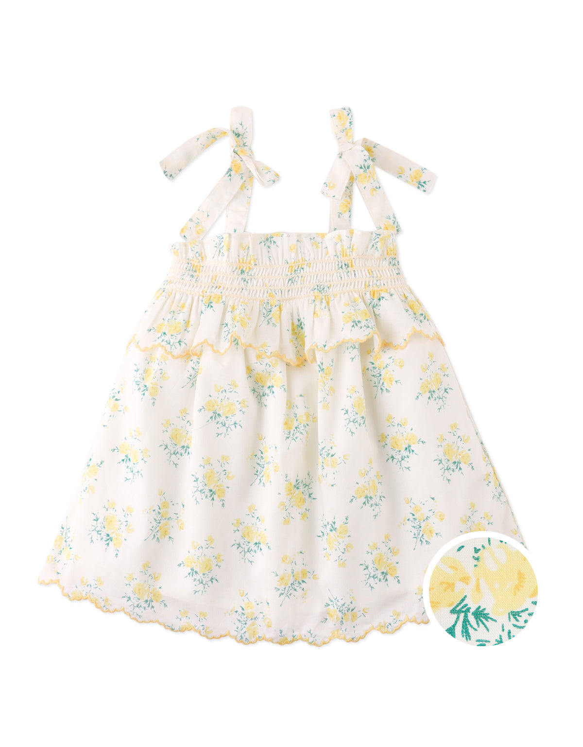 Campaign photo of the Baby Katie Embroidered Tiered Dress with Tie Straps for infant girls from the Spring Summer collection of Filipino kids fashion brand Gingersnaps Philippines, featuring floral print, botanical embroidery, and tiered layers.