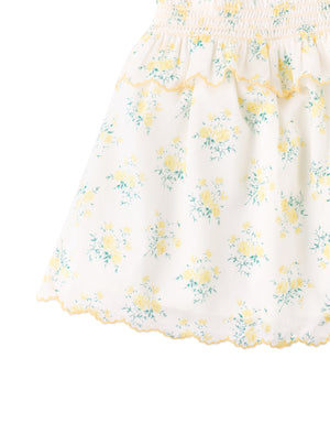 Flatlay front view of the Baby Katie Embroidered Tiered Dress with Tie Straps with floral print and tiered construction from the Spring Summer collection of Filipino kids fashion brand Gingersnaps Philippines.