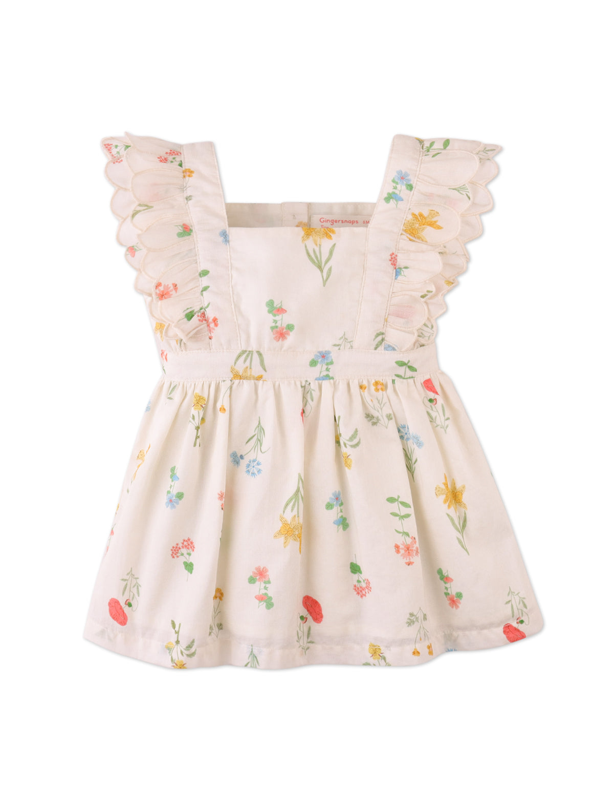 Campaign photo of the Baby Chisa Dress with Embroidered Petal Ruffle Sleeves for infant girls from the Spring Summer collection of Filipino kids fashion brand Gingersnaps Philippines, featuring floral embroidery and petal-inspired ruffle sleeves.