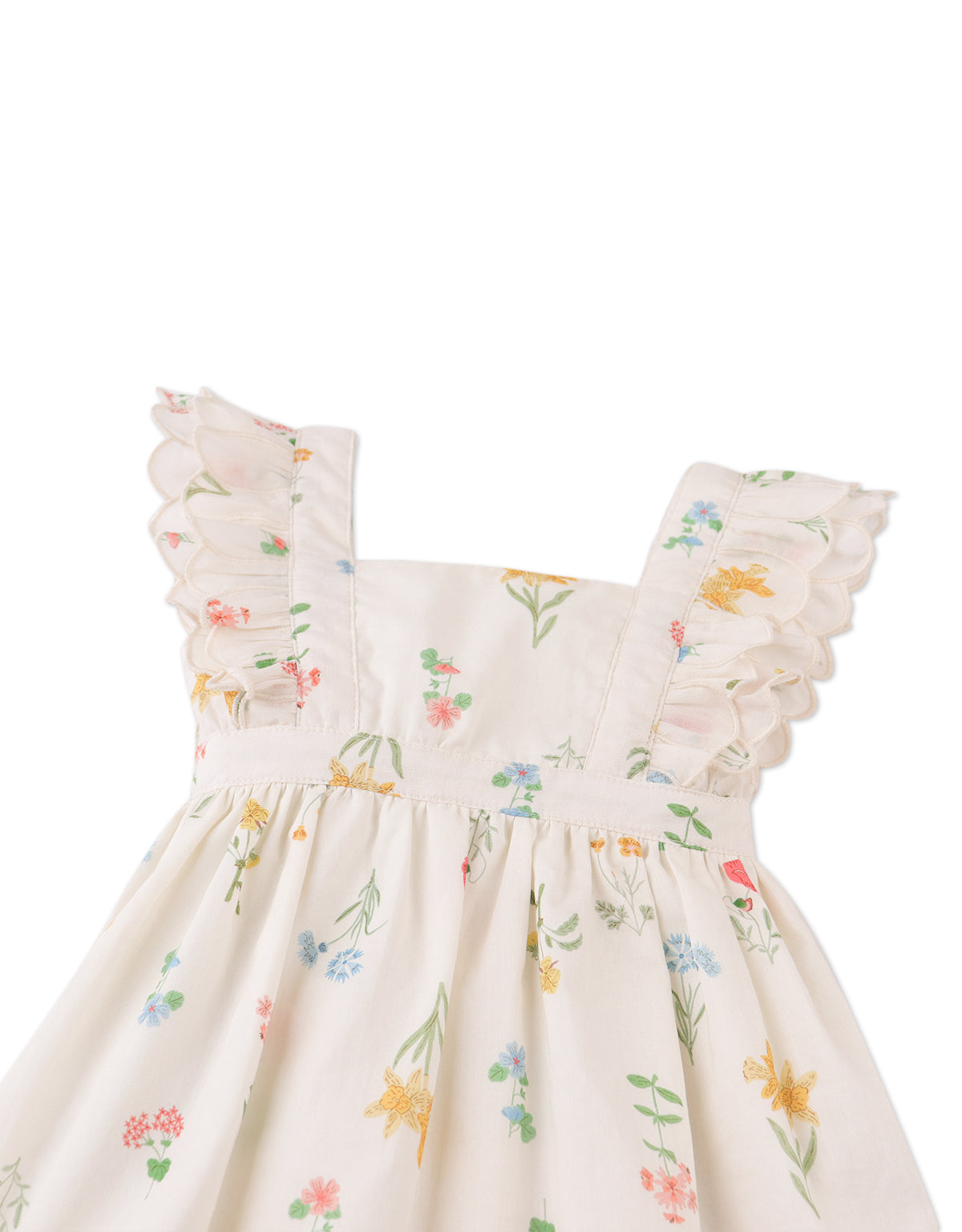 Close-up front detail of the Baby Chisa Dress with Embroidered Petal Ruffle Sleeves, highlighting embroidered floral accents and ruffled sleeve detailing from the Spring Summer collection of Gingersnaps Philippines.