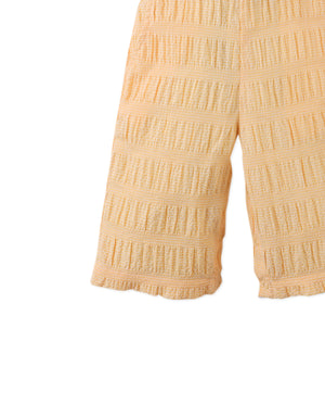 Flatlay front view of the Baby Cocona Checkered Jumpsuit with Botanical Embroidery, showcasing checkered pattern and embroidery details from the Spring Summer collection of Filipino kids fashion brand Gingersnaps Philippines.